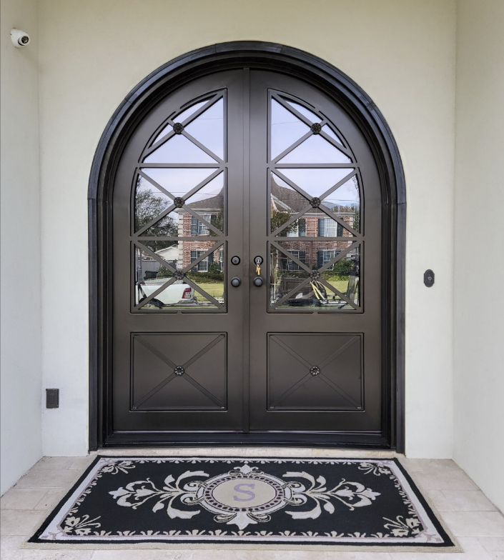 Iron doors are often considered more aesthetically pleasing and can add a touch of elegance and charm to a property.